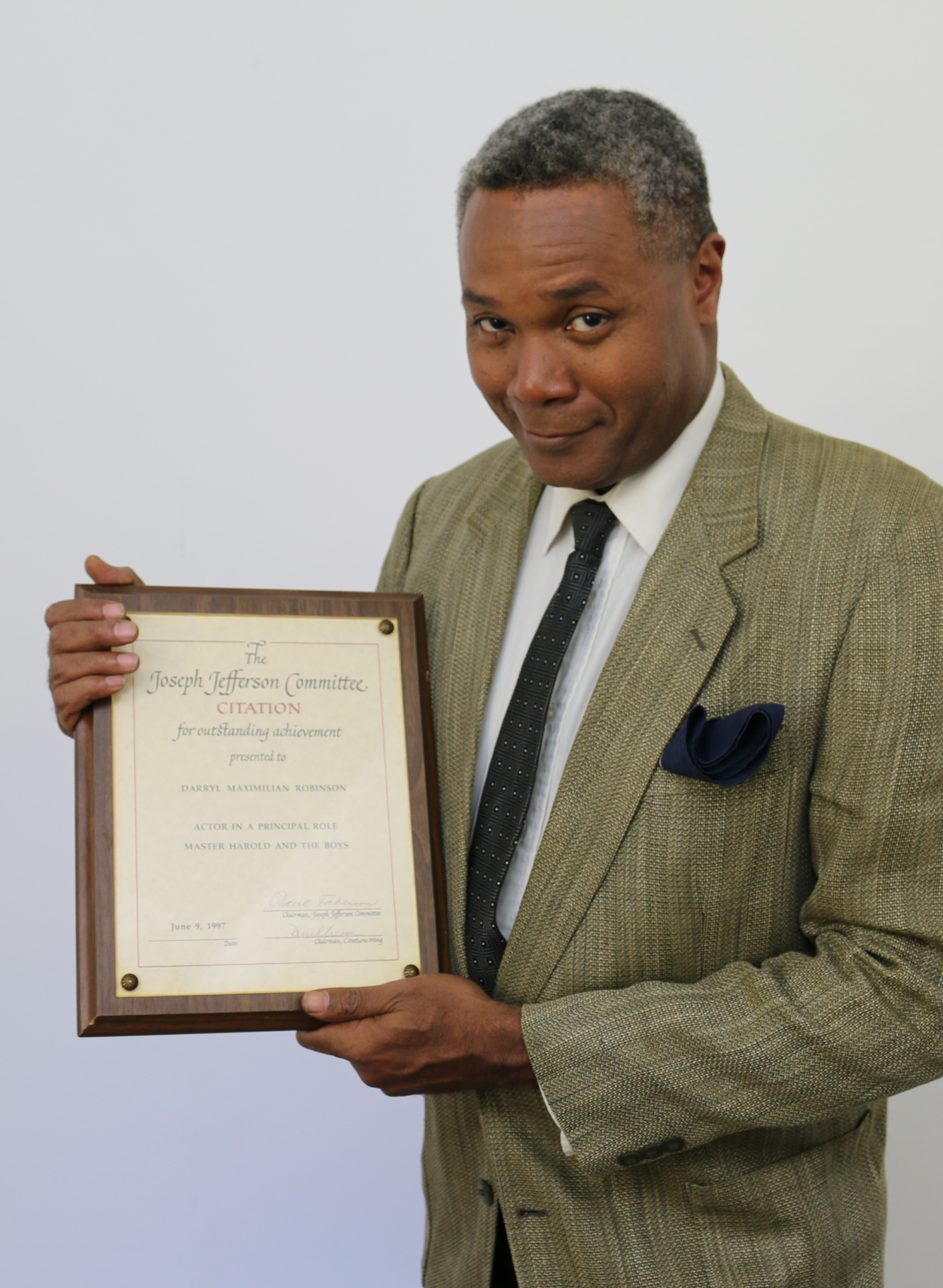 A Fine Honor: 2017 Photo of Darryl Maximilian Robinson with his 1997 Chicago Joseph Jefferson Citation Award for Outstanding Actor In A Play for Master Harold And The Boys by Jessie L. Watt.