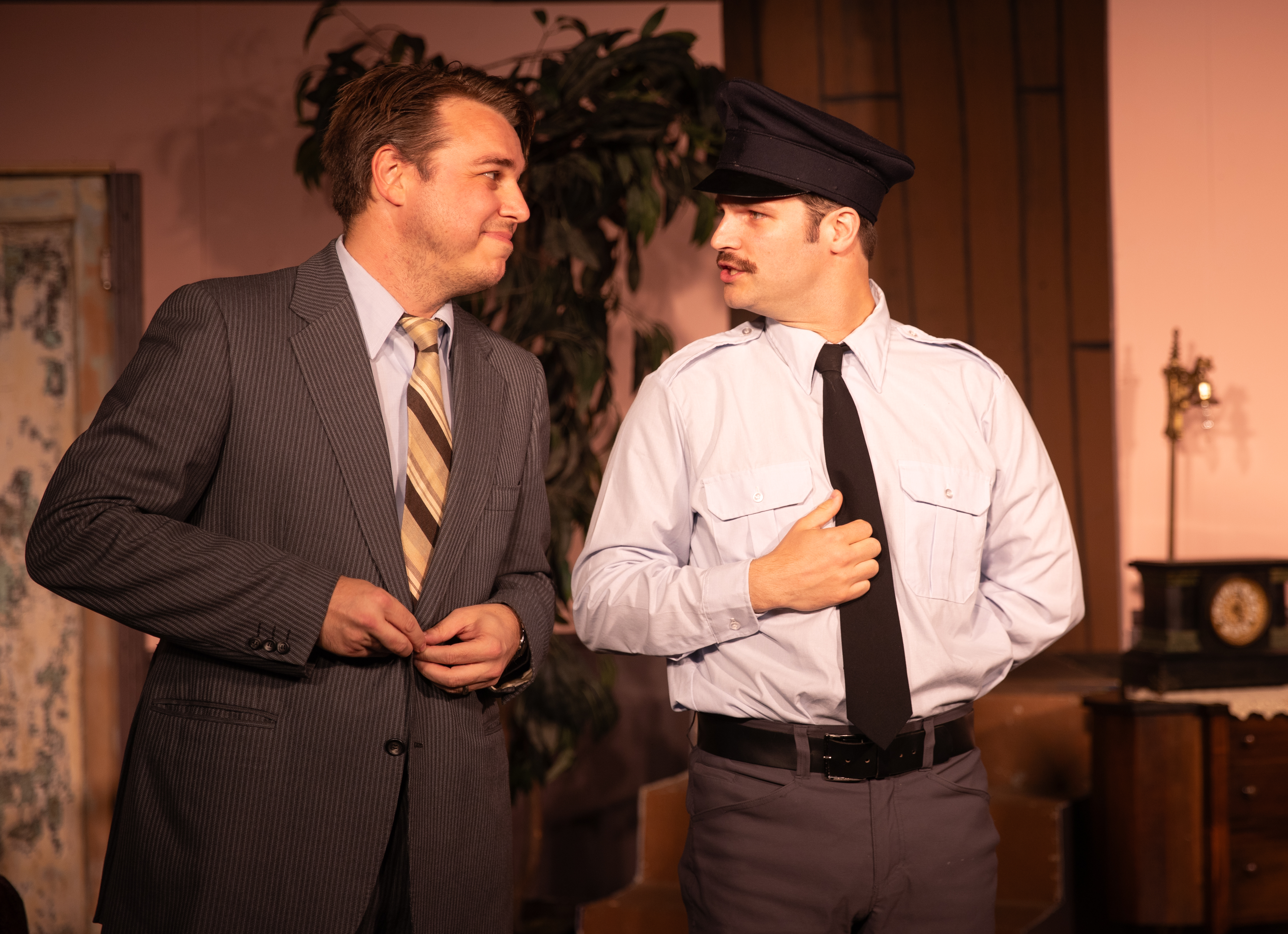 Chris Linn as MORTIMER BREWSTER and Justin Stewart as OFFICER O''HARA