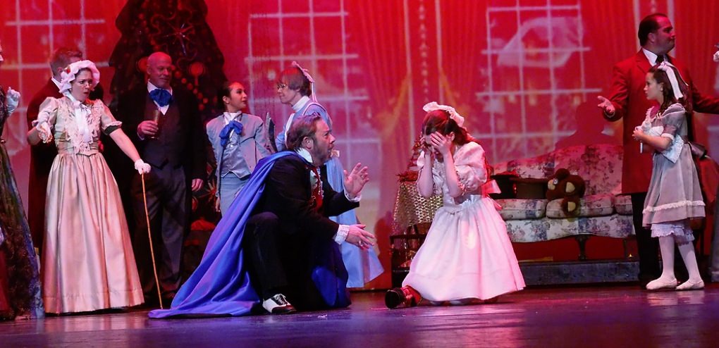 Uncle Drosselmayer consoles Clara after Fritz destroys the Nutcracker. Uncle Drosselmayer consoles Clara after Fritz destroys the Nutcracker.