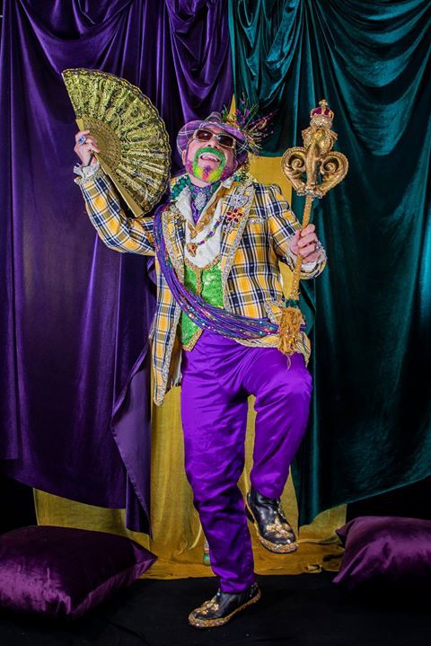 Grand Marshal Marty Graw (Edward R. Cox) joins in on the Carnival Revelry during The Professor Carl Nivale Show.  Photo by Roy Guste.