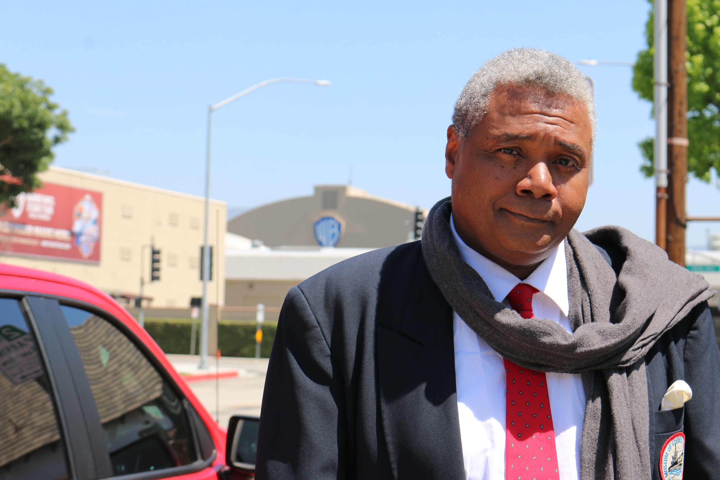 From a street bordering the famed Warner Bros. Hollywood Studios in Burbank, CA., veteran and award-winning stage actor and play director Darryl Maximilian Robinson ponders his visit to UBNGO Radio and Television Studio to appear for the fourth time on Ron Brewington's 'The Actor's Choice'. Photo by J.L. Watt.