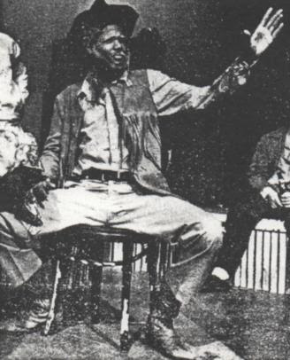 Tall Tales: Darryl Maximilian Robinson as cowboy Kit Carson in the 1981 Enchanted Hills Playhouse of Syracuse, Indiana revival of The Time of Your Life by William Saroyan. 