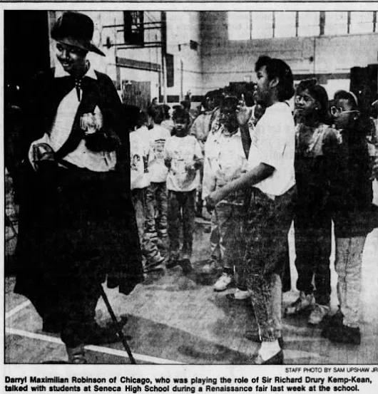 Bard At Seneca: Jan. 1990 Courier Journal of Louisville, Ky. Photo of Darryl Maximilian Robinson as Sir Richard Drury Kemp-Kean at a high school Ren Faire after his one-man show A Bit of the Bard.