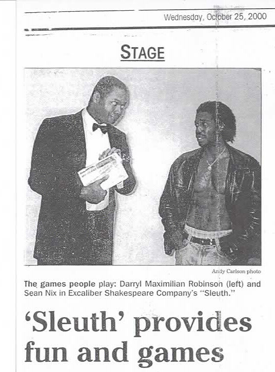 An Ebony First: Director Darryl Maximilian Robinson as Andrew Wyke and Sean Nix as Milo Tindle in the 2000 Excaliber Shakespeare Company of Chicago all-black cast revival of Sleuth by Anthony Shaffer.