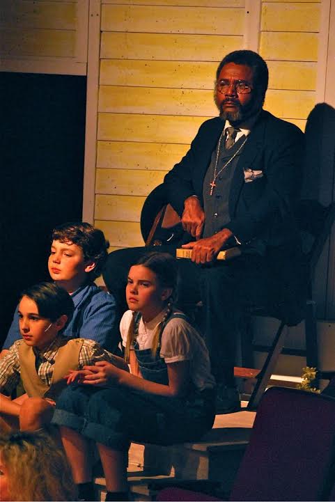 The Trial: Darryl Maximilian Robinson as The Reverend Sykes, Carter Thomas as Dill, Liam Johnson as Jem and Camille Gibney as Scout in the 2011 Glendale Centre Theatre To Kill A Mockingbird.