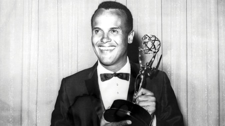 AMERICA'S FIRST AFRICAN-AMERICAN MALE PERFORMER TO WIN THE EMMY!: Here is the legendary star Harry Belafonte with his 1960 Emmy Award as Outstanding Performer for his 1959 television music special 