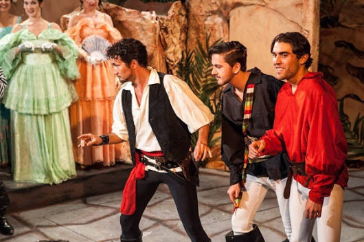 A Lusty Pirate King And His Equally Lusty Fellow Pirates!: Director / Choreographer / Performer Drew Fitzsimmons as The Pirate King and William Ardelean and Dash Porter as Fellow Pirates peruse The Daughters of Major-General Stanley in the 2014 San Pedro Theatre Club's 135th Anniversary Revival Production of Gilbert and Sullivan's 'The Pirates of Penzance'. Photo by Koop. 