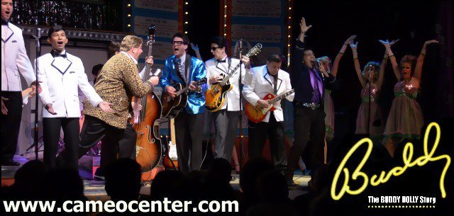 BUDDY HOLLY performers on stage.