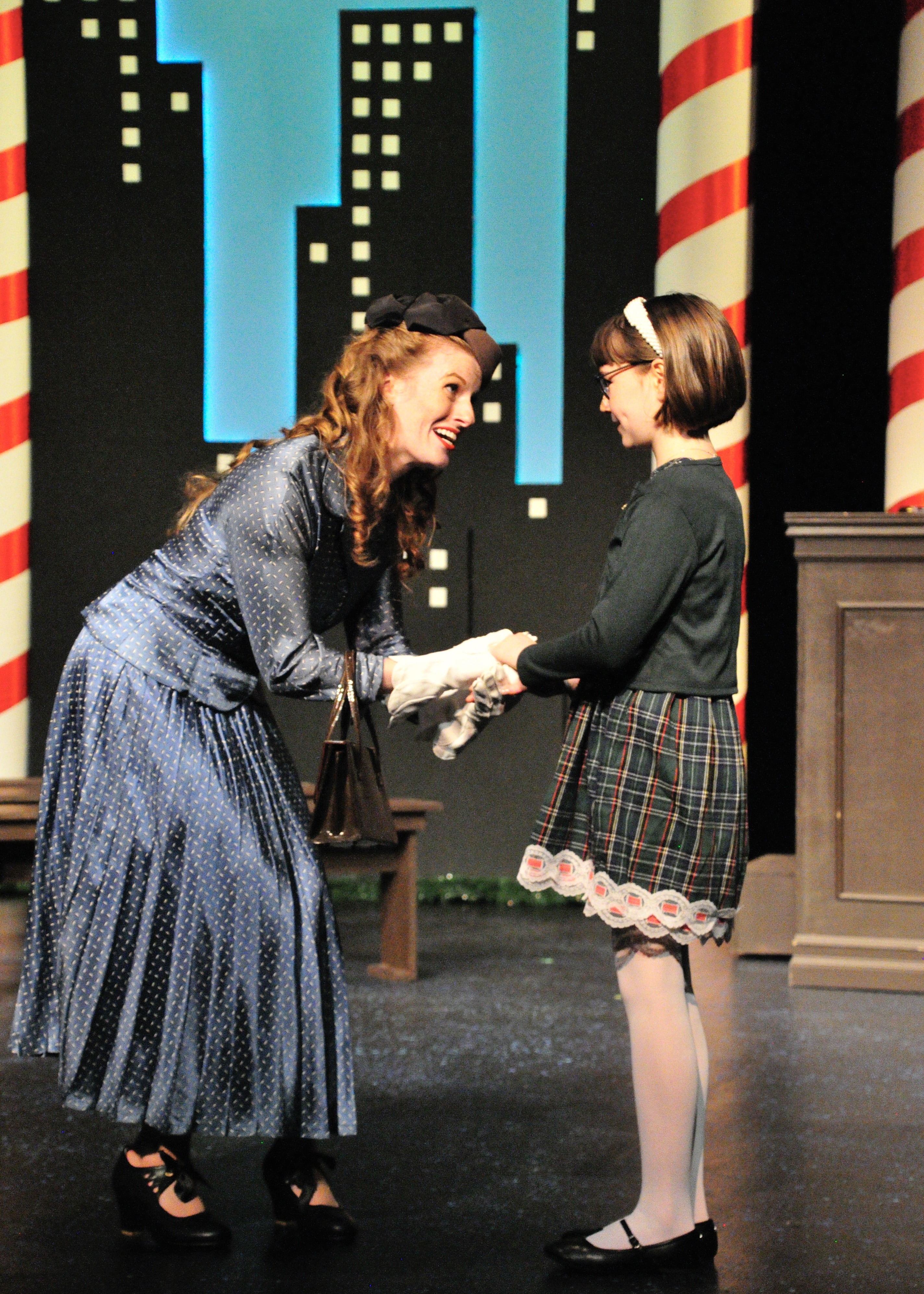 Miracle on 34th Street, the Play at Lakewood Theatre Company Nov. 7 - Dec. 14, 2025. Web: www.lakewood-center.org Pictured (left to right): Ariel Puls, and Georgia Krugel.