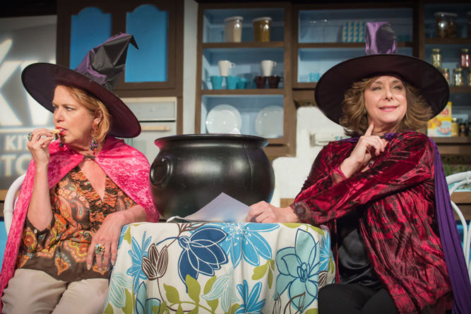 Dolly (Lana K. Hoover, Left) and Izzy (Sherry Etzel) address viewer mail on The Ktichen Witches. Photo by James Jamison