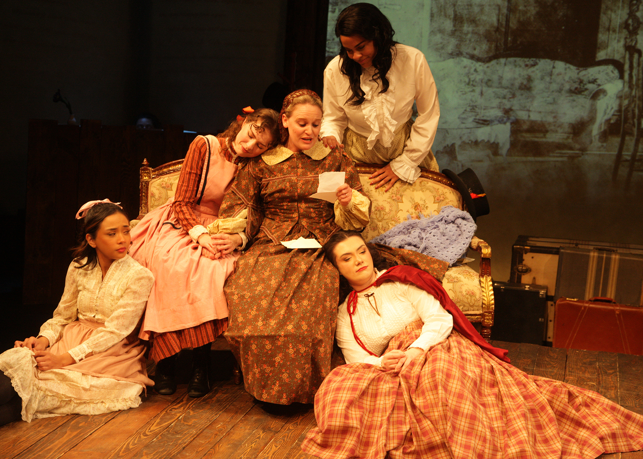 Camie Del Rosario as Amy March, Emily Abeles as Beth March, Maggie Randolph as Marmee March, Katherine Chatman as Meg March, and Sarah Pierce as Jo March Chance Theater's production of 