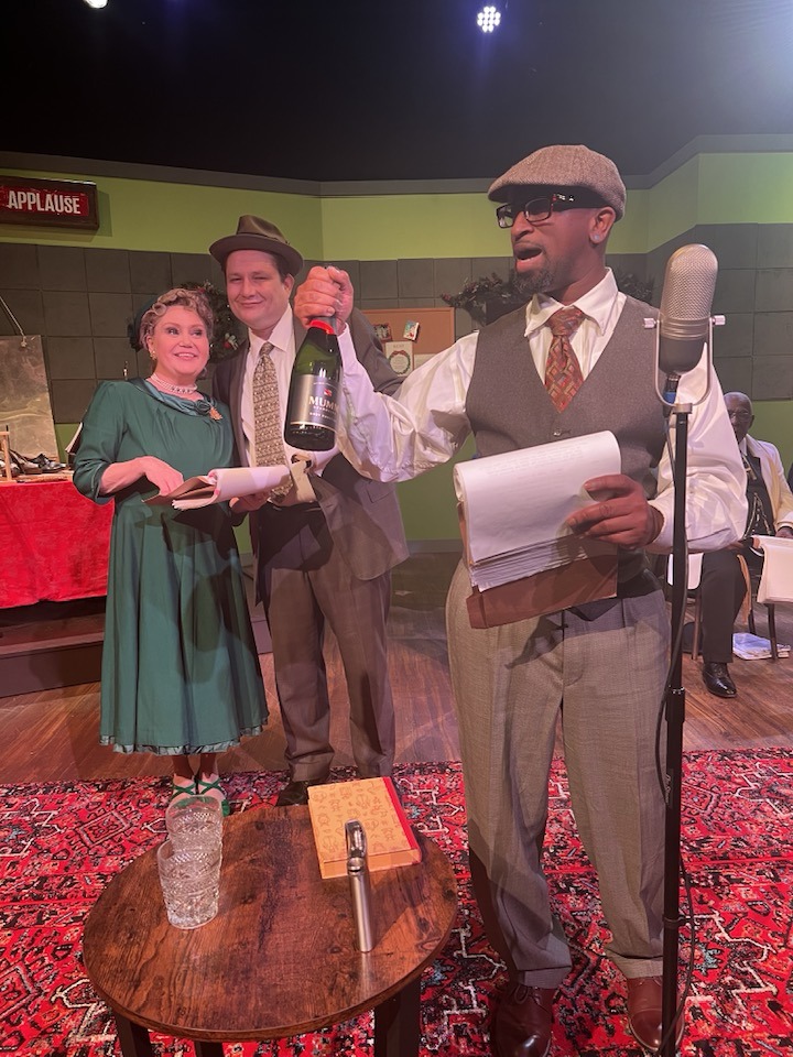 Here, the newlyweds are ready to celebrate, but will Ernie get the Baileys to the train? Pictured L-R: Shelly Harmon, C.W. Bardsher, K. DerRon Vinson Here, the newlyweds are ready to celebrate, but will Ernie get the Baileys to the train? Pictured L-R: Shelly Harmon, C.W. Bardsher, K. DerRon Vinson