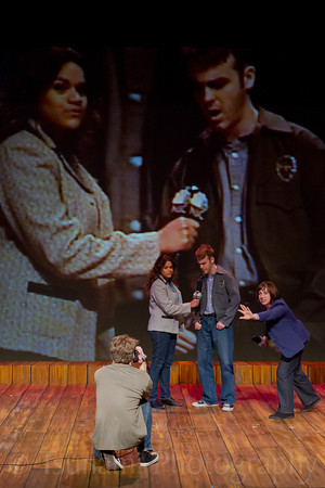 Live feed- a reporter interviews Sergeant Hing.

© 2012 by Louis E. Keiner and Lesley M. Etherson