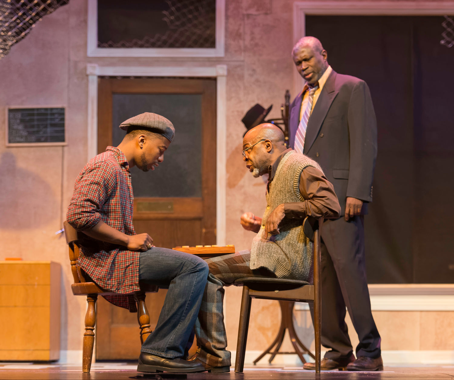 ShawnJ West (Turnbo), L. Peter Callender (Becker), and Edward Neville Ewell (Youngblood) in African-American Shakespeare Company’s production of ‘Jitney’, directed by L. Peter Callender; photo credit: Lance Huntley 2