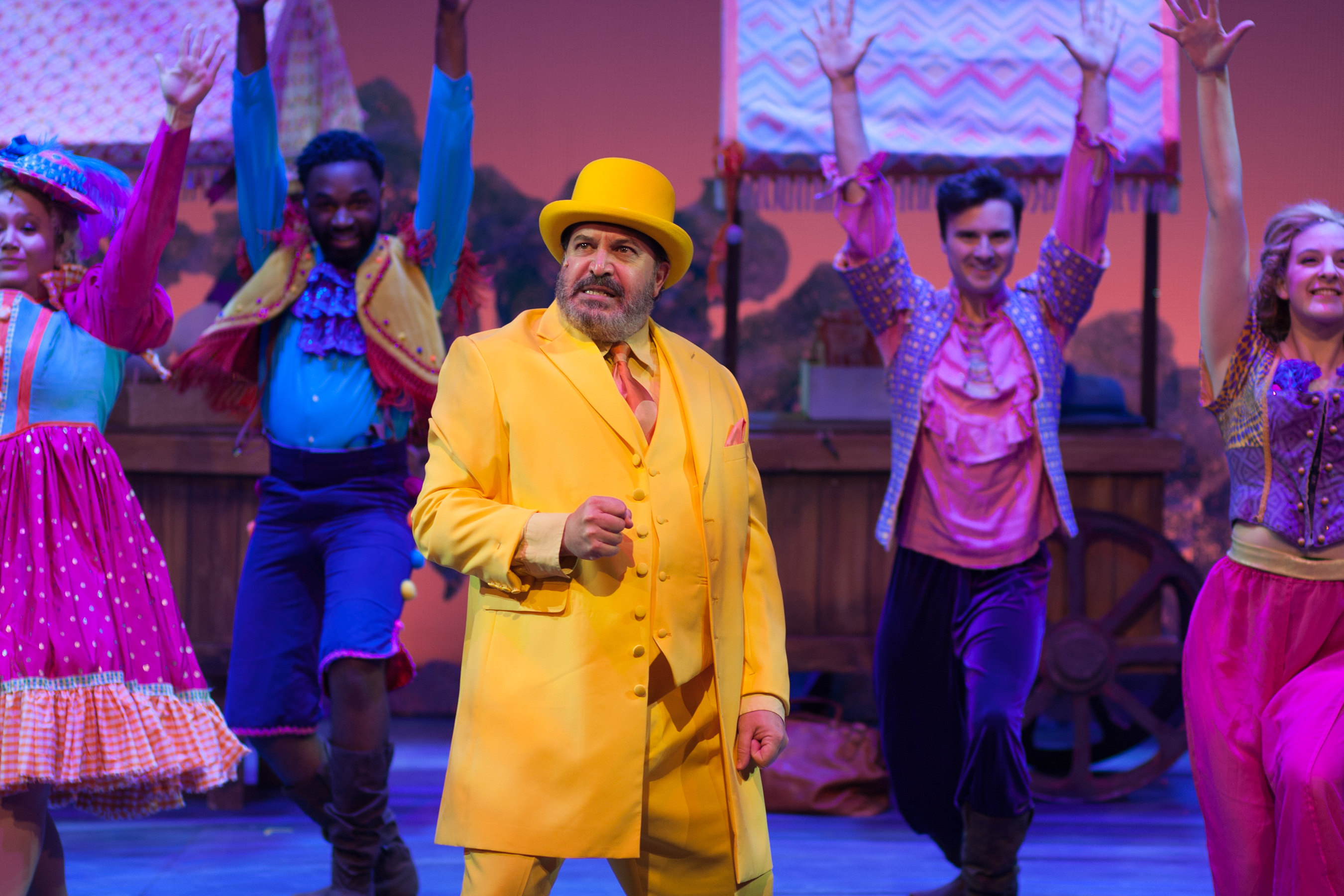 Robert Saoud* plays the Man in the Yellow Suit in The Umbrella Stage Company's production of Tuck Everlasting, the magical family musical with a serious side. (Photo by Gillian Gordon) 