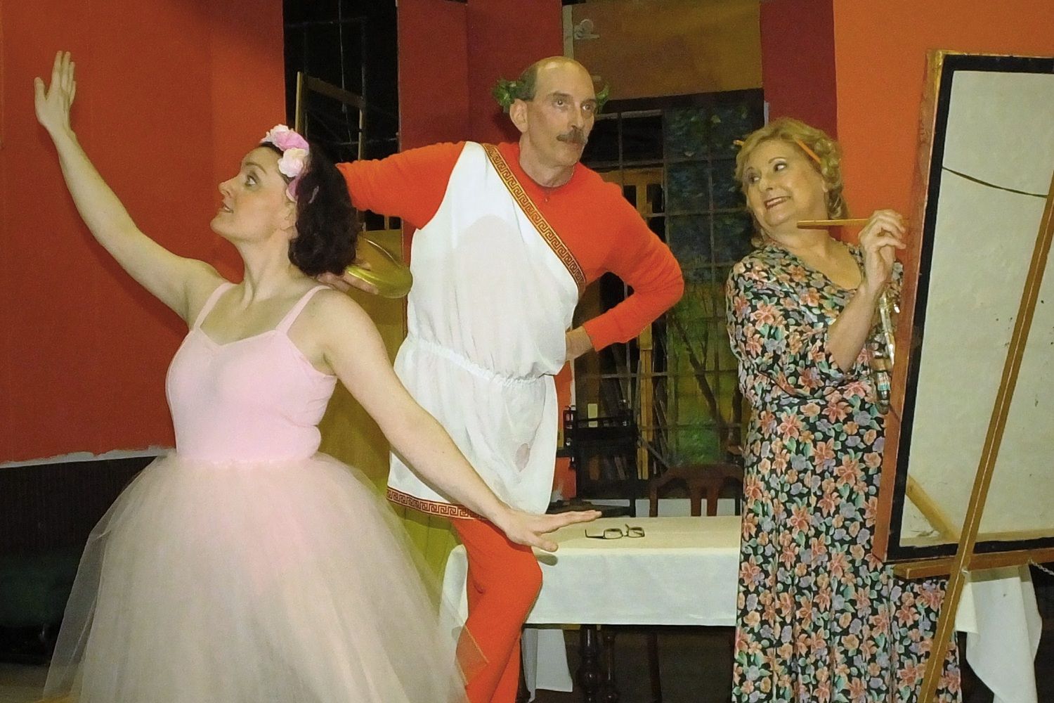 Just a normal typical day at the Sycamore house filled with ballet lessons, painting, snakes, xylophones and fireworks. Essie (Kathleen Duffy, pictured left), Mr. DiPina (Steve Roberts, pictured center) and Penny Sycamore (Sue Chekaway) star in this charming comedy; You Can’t Take It With You.