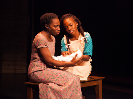 Apphia Campbell (Celie) and Khadijah Rolle (Nettie) admire Ceile's baby | Photo by Don Daly Photo 3