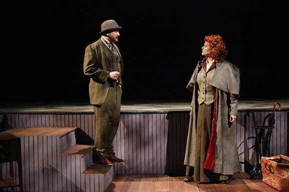 Miss Holmes (Phoebe Sanborn, right) dazzles on stage as Miss Sherlock Holmes! With Tim Croce as Thomas Chapman (left).