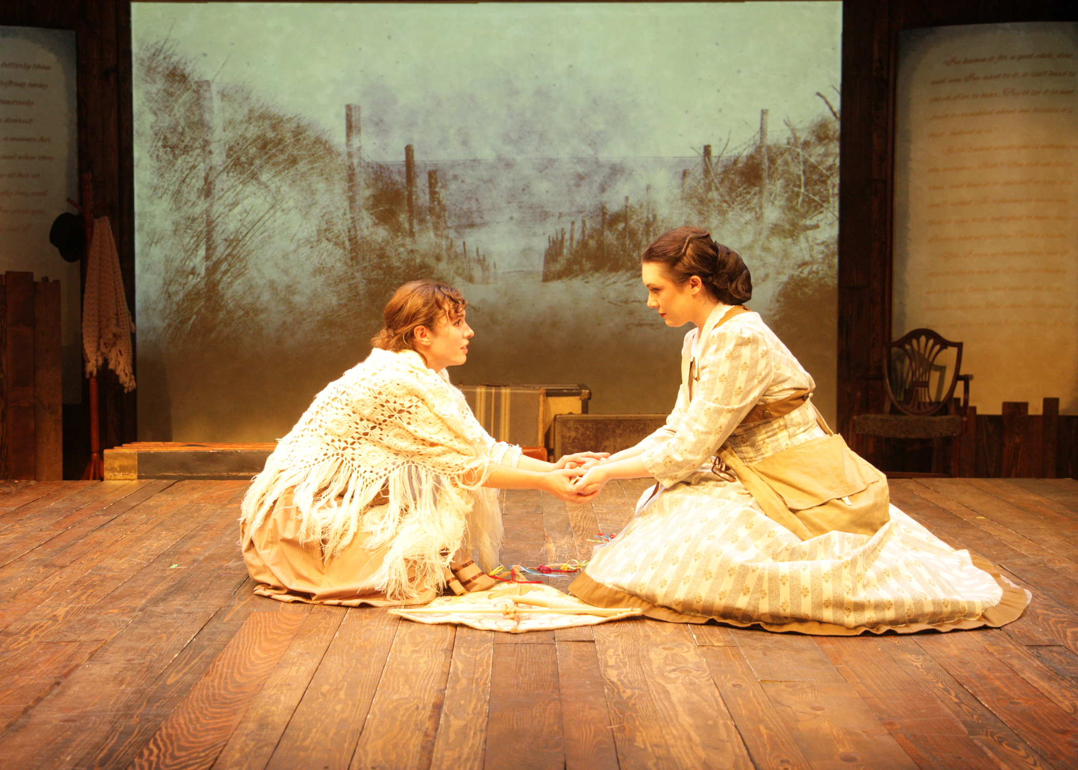 Emily Abeles as Beth March and Sarah Pierce as Jo March Chance Theater's production of 