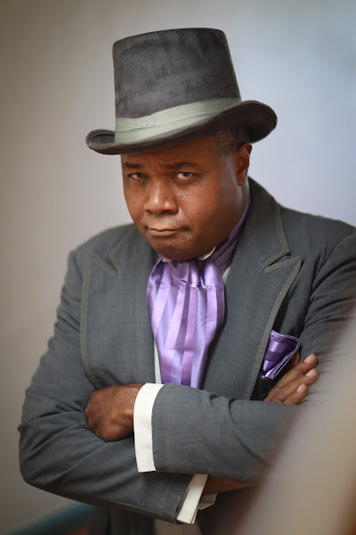 Seen as Drake in Adult Swim's Loiter Squad, veteran stage actor and play director Darryl Maximilian Robinson was most recently cast as Mayor George Shinn in the 2022 revival of Meredith Willson's The Music Man presented at The Fremont Centre Theatre in South Pasadena. Photo by Eric Michael Hernandez. Costume design by Tamarah Ashton. 