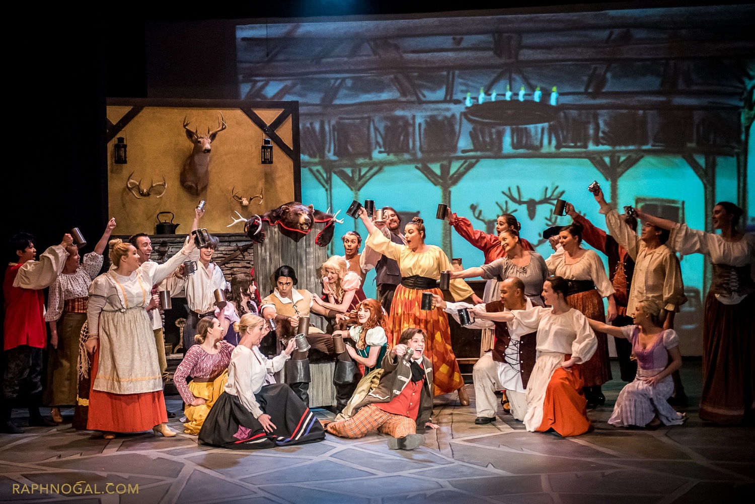 The villagers led by LeFou (Kyle Humby) sing the praises of Gaston ( Rob Murphy): photo credit raphnogal.com 1