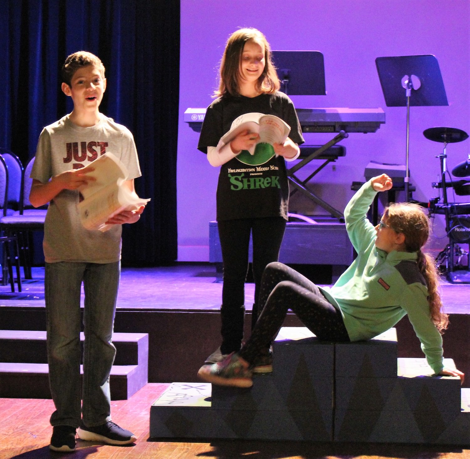James Ciccarelle (Boy/Peter), Danielle Becht (Molly), and Mia Ciccarelle taken a moment from working a scene to get a note from the director during rehearsal for 