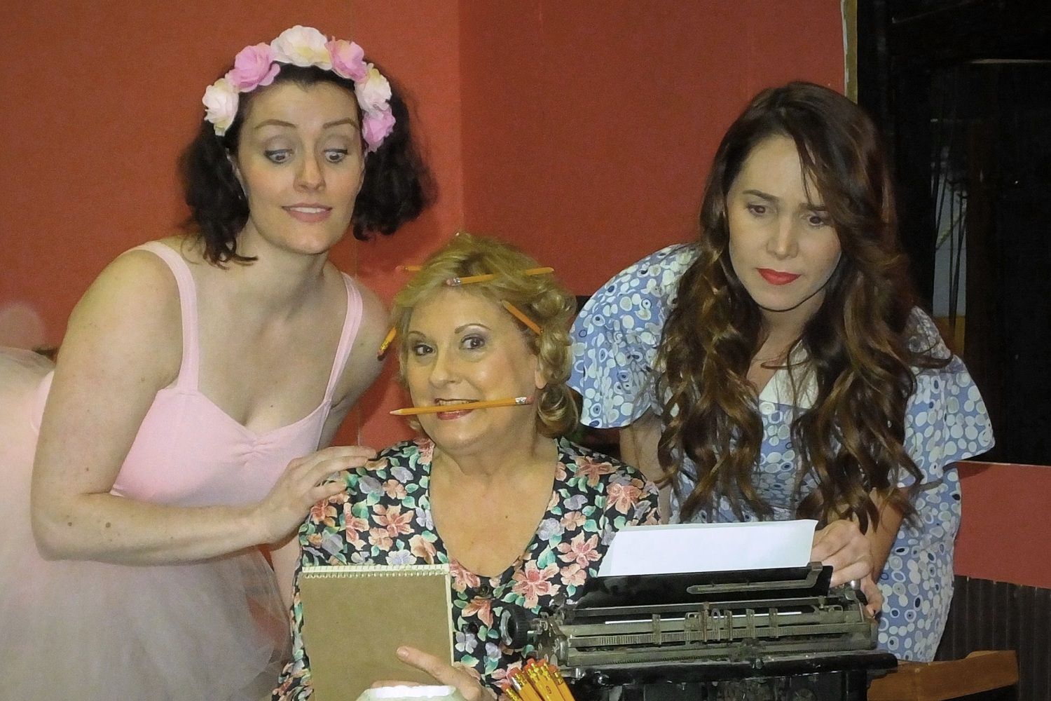 One of the many of unusual hobbies of Penny Sycamore (Sue Chekaway, pictured center) writes plays that she never seems to finish. Her doting daughters; Essie (Kathleen Duffy, pictured left) and Alice (Carson Delaney, pictured right) The Comedy hit, You Can’t Take It With You playing March 10-26.