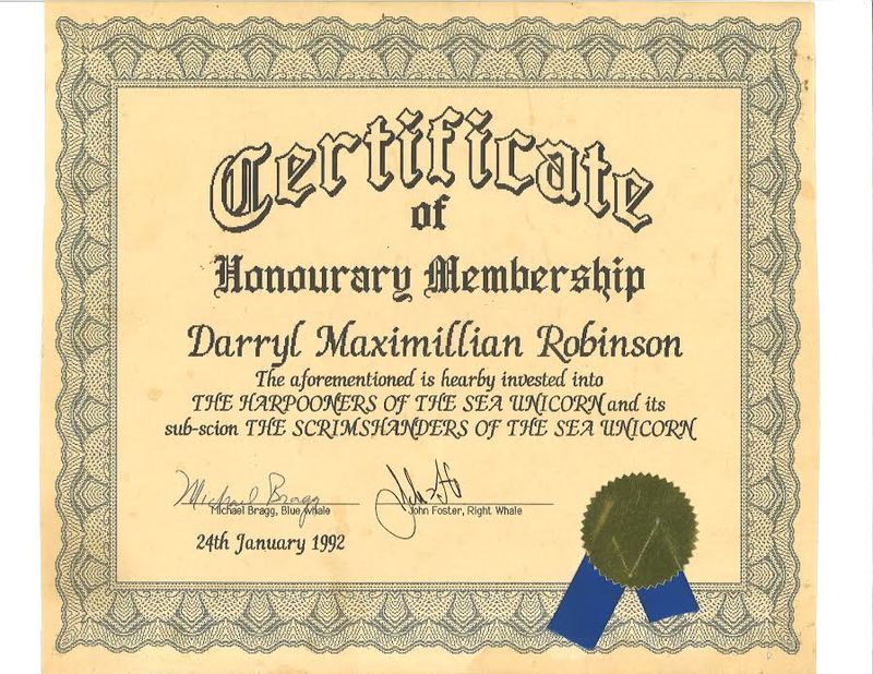 An Honored Holmes: Darryl Maximilian Robinson is winner of a 1992 Certificate of Honourary Membership Award from The Harpooners of the Sea Unicorn, The Sherlock Holmes Society of St. Charles, Missouri