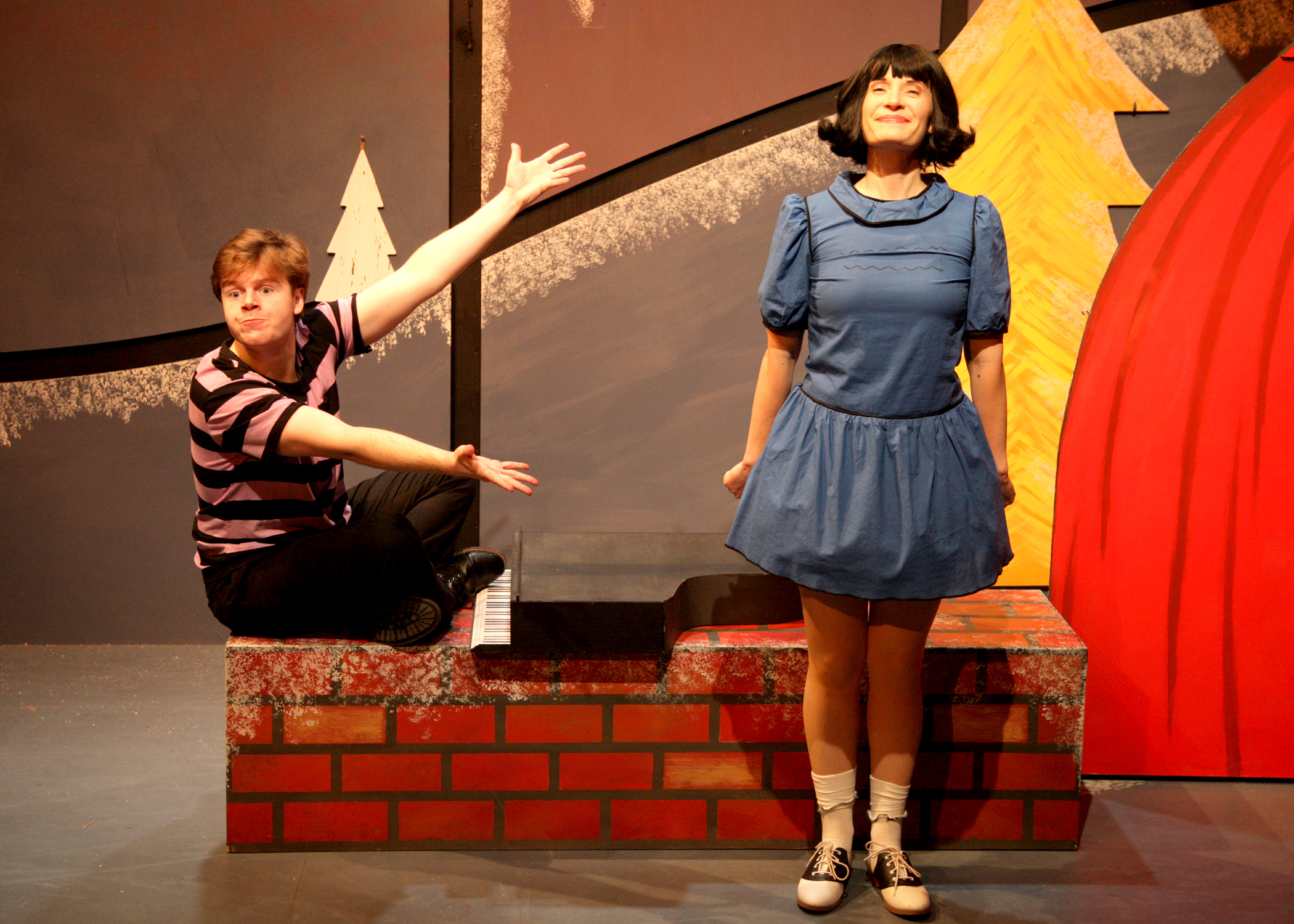 Christopher Diem and Laura M. Hathaway in the encore presentation of “A Charlie Brown Christmas.” This live version of Charles Schulz’s classic television special adapted by Eric Schaeffer and directed by James Michael McHale will run thru December 19, 2021 on the Fyda-Mar Stage at the Bette Aitken theater arts Center.
