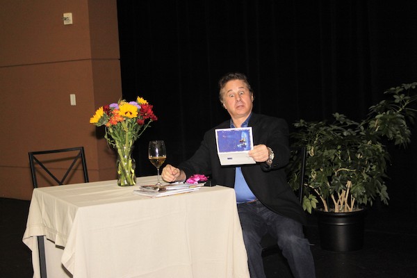 Peter Fogel on stage performing "Til Death Do Us Part... You First!"