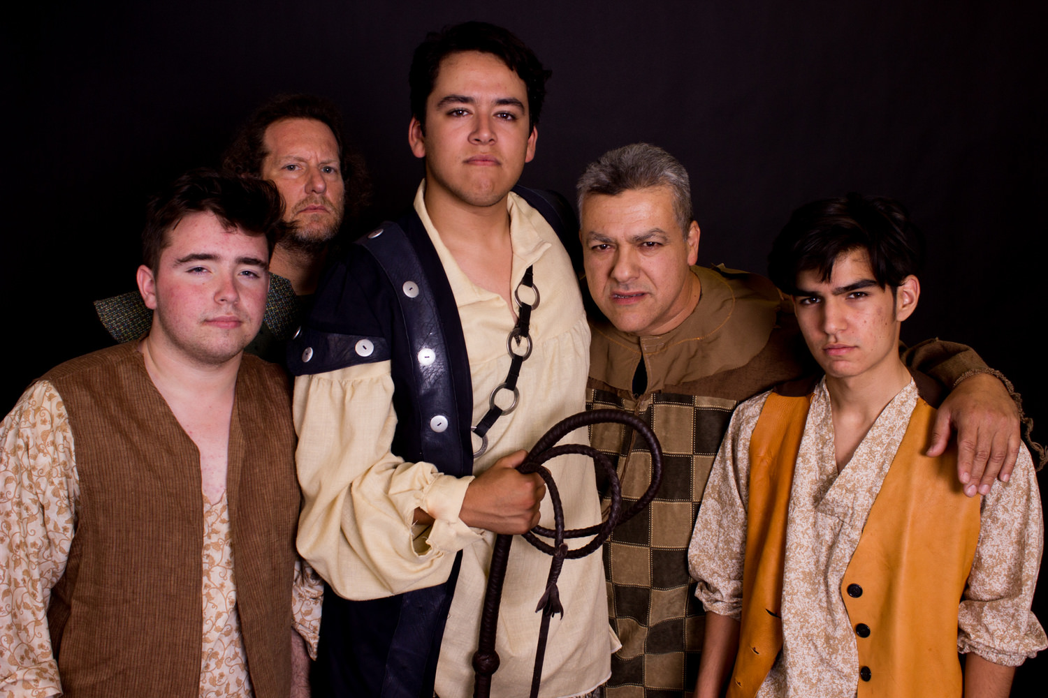 From left to right: Justice Krugman (Barber; Muleteer), Kevin Coren (Muleteer), Emilio Lopez (Pedro; Captain of the Inquisition), Jesse Rodriguez (Padre; Muleteer; Guitar Player) and Josh Velazquez (Anselmo; Muleteer) in the Ghostlight Theatre Ensemble production of 