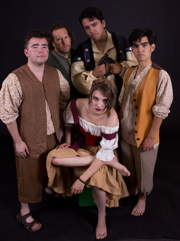 Mikayla Thompson (Aldonza/Dulcinea) surrounded by her tormentors in Ghostlight Theatre Ensemble production of 