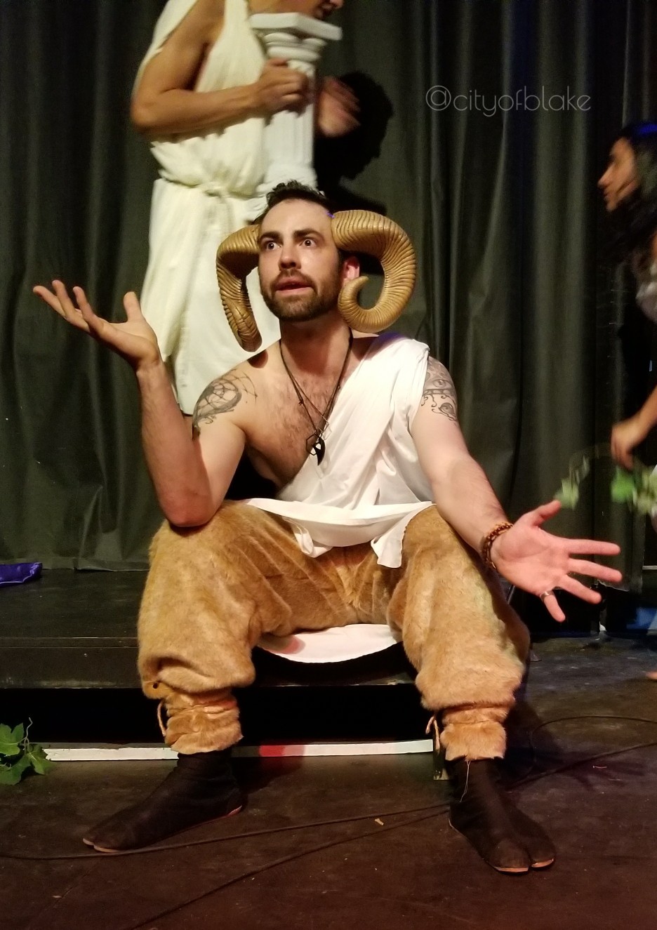 Pan (Max Wingert) describes his ennui during The PennyPan Cabaret
