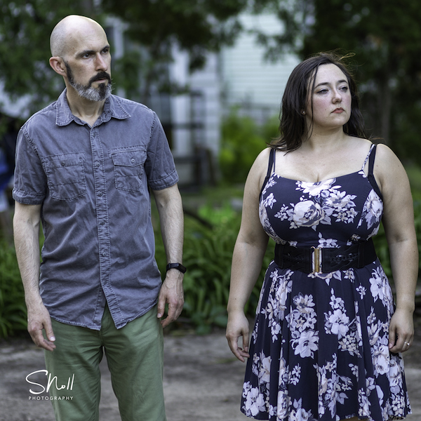 Leonato and Donna Gianna watch the wedding of Hero and Claudio rapidly break down.