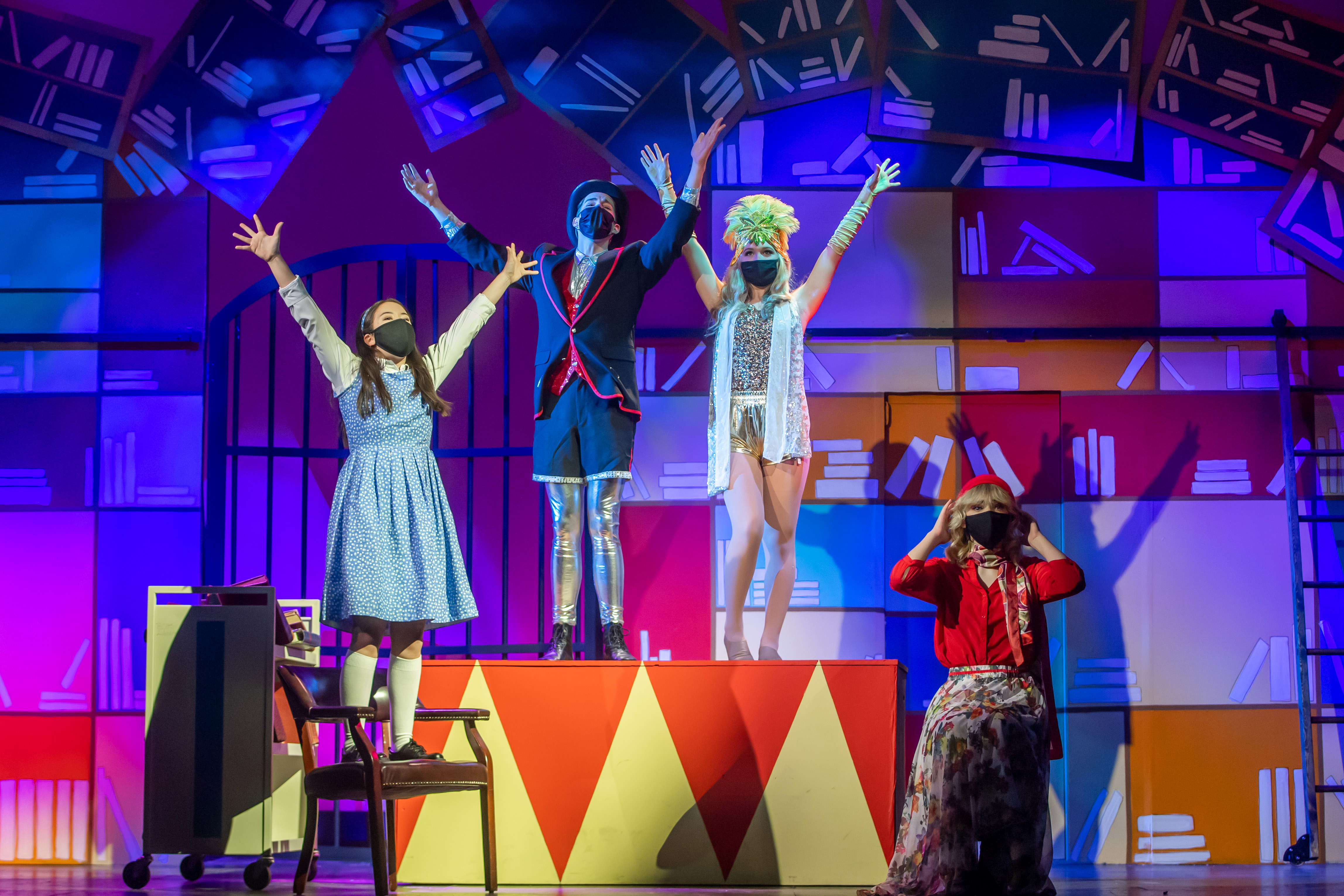 Matilda telling the story of the Escapologist and the Acrobat to the librarian.
Matilda Wormwood - Olivia C Cheng
Escapologist - West Sepko
Acrobat - Elle Connell
Mrs. Phelps (librarian) - Isabelle Johnson
