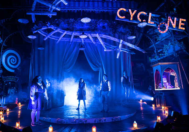 (l to r) Gabrielle Dominique (Constance Blackwood), Matthew Boyd Snyder (Ricky Potts), Shinah Hey (Ocean O’Connell Rosenberg), Nick Martinez (Noel Gruber), Eli Mayer (Mischa Bachinski), and Marc Geller (The Amazing Karnak) in Ride the Cyclone running January 13 through February 19 at Arena Stage at the Mead Center for American Theater. Photo by Margot Schulman.