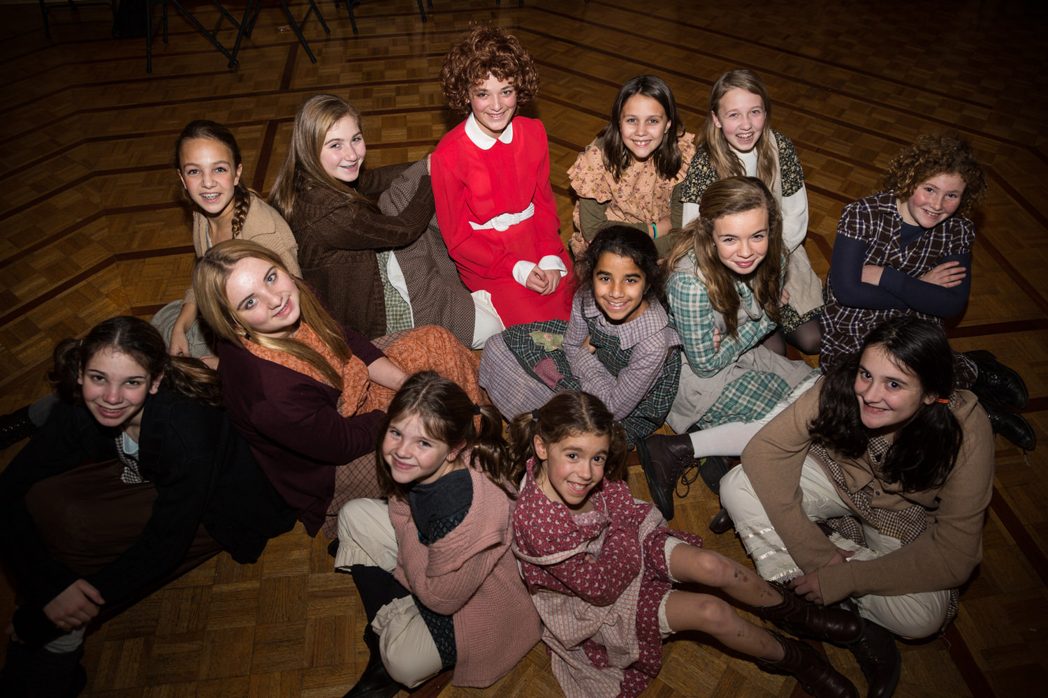ShowKids' orphans prepare for SKIT's production of Annie, Jan 25-Feb 2 - www.showkids.org/tickets. Pictured are top row (L-R) Leanna Schultz, Haley Marra, Brooke Wachenheim as 