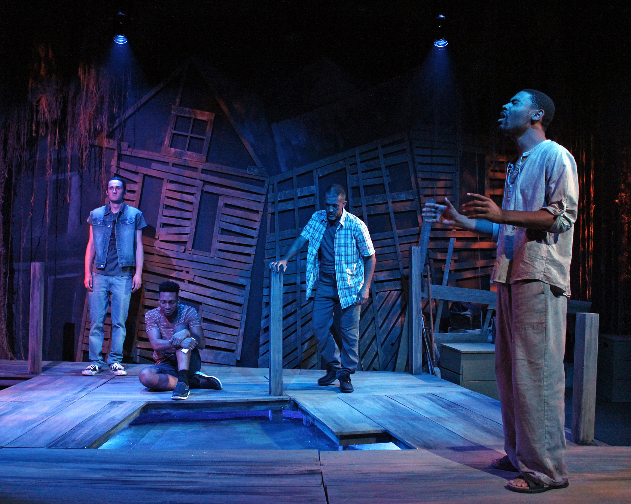 Timothy Hackbarth, Stefon Funderburke, Scott Norman and Jesse Boyd-Williams in Williamston Theatre's production of 