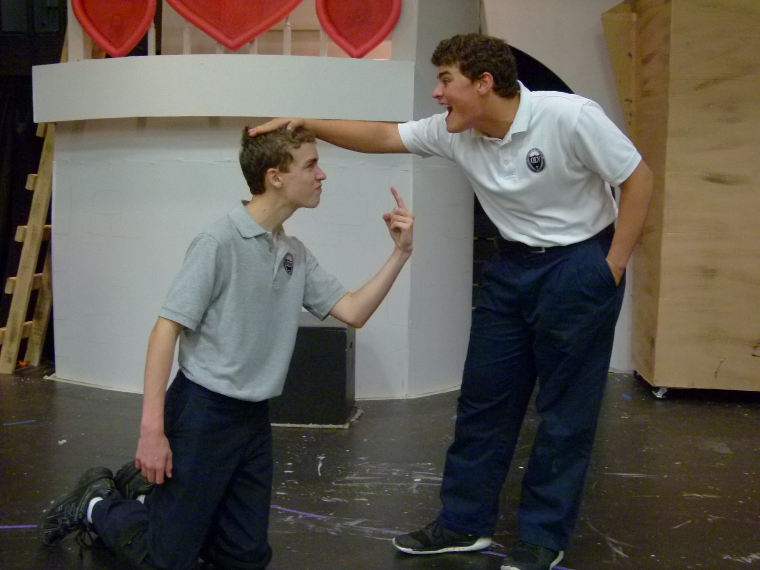 Chandler Norman (L), 7th grader "Lord Farquaad," and C J Romano (R), 8th grader "Shrek" rehearse a scene from the upcoming production of Shrek The Musical JR.