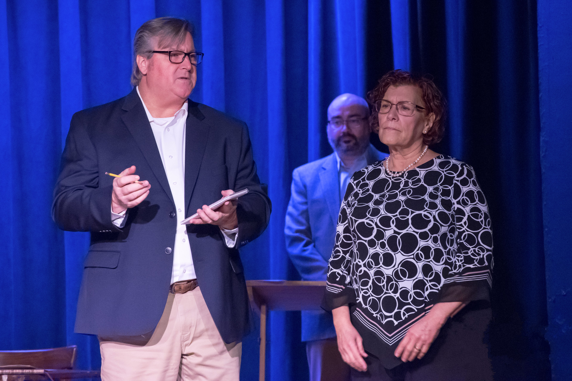 Actor Michael Clendenin (left), in the role of the Interviewer Claude Lanzmann, actress Sherry Bendt (right), portraying Mrs. Pietyra recalling her time at Auschwitz, and actor Ricardo Padilla (center) portraying Holocaust scholar Raul Hilberg in Fauquier Community Theatre's production of SHOAH. Photo Credit: Stephen Rummel Photography.