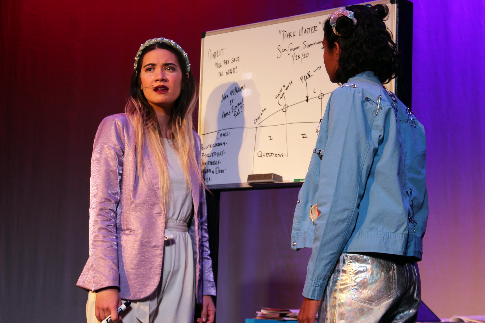 Sam (Stephanie Fongheiser) laments her work as her sister Vanessa (Nina Jayashankar) comforts her in “Double Vision” at The Edge Theater. Photo by Katy Campbell.
