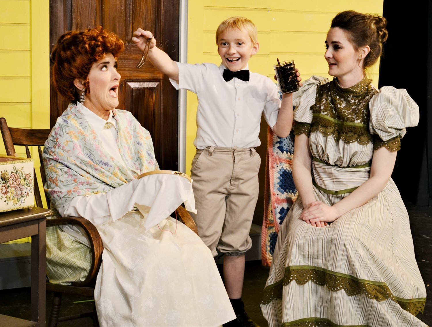 A photo collage of members of the cast of The Music Man 3