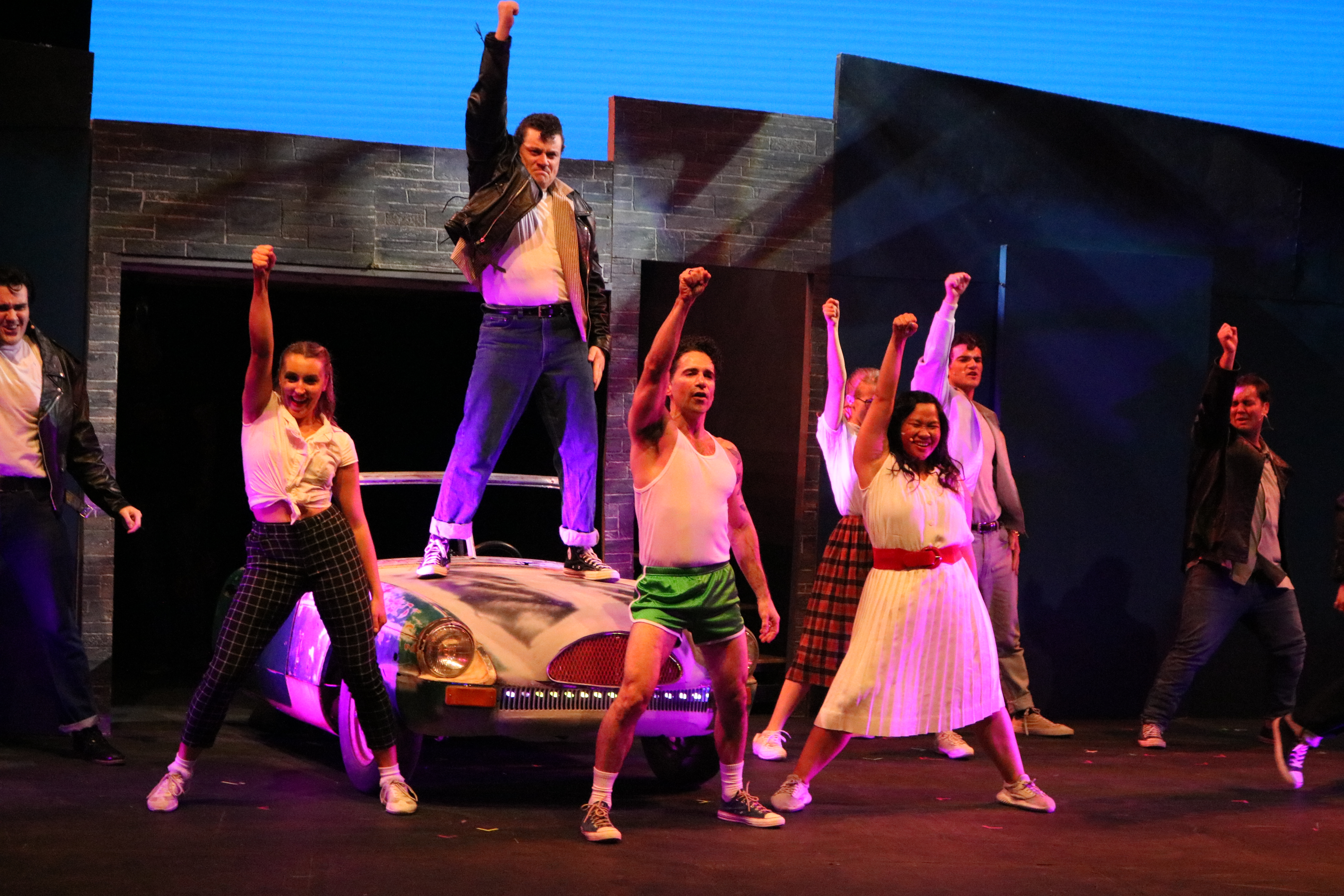 Brennan Kliztner and the cast of Grease