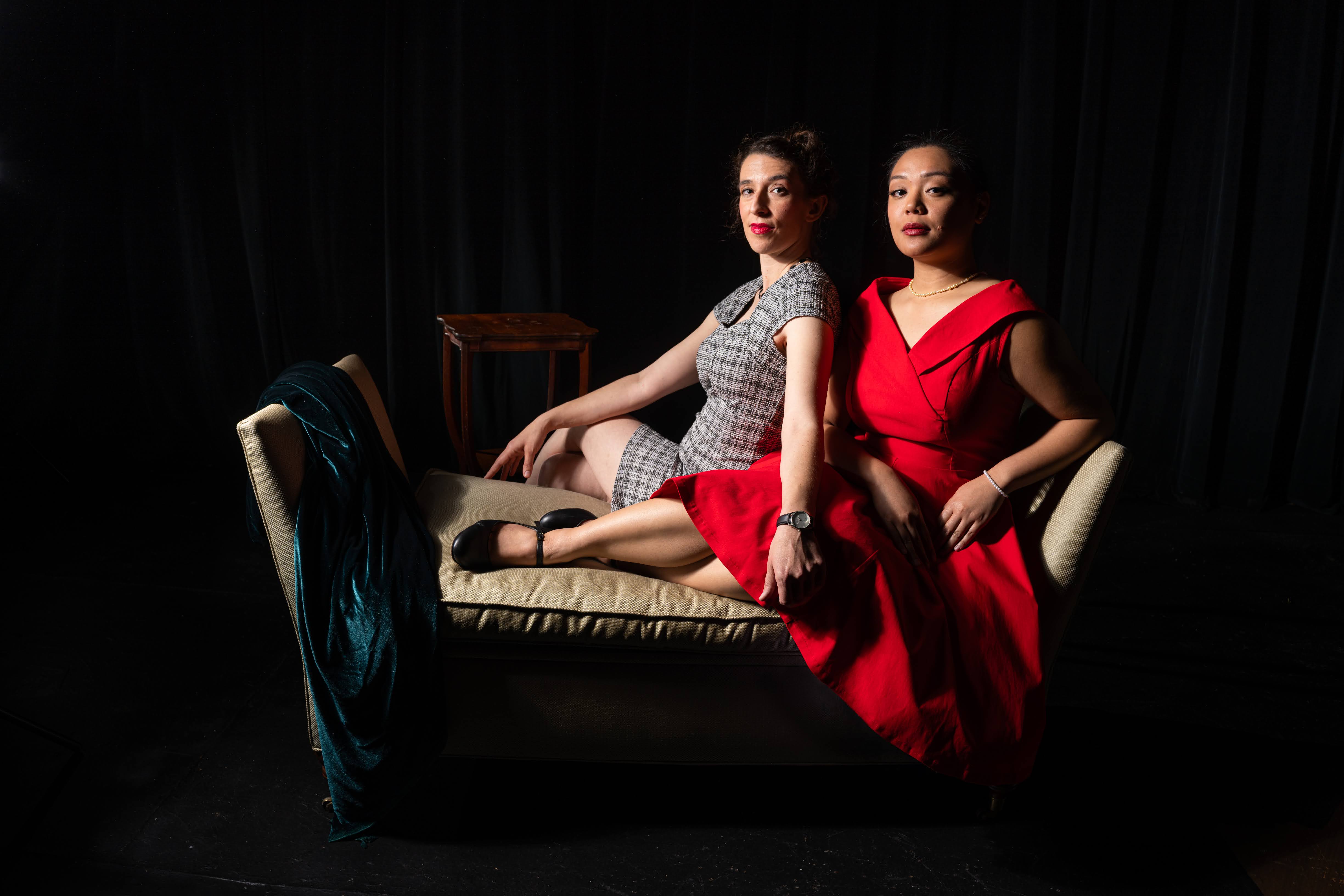 In Dial M for Murder, Maxine (Maria Marquis, left) and Margot (Gwynnevere Cristobal) have tried to stay away from each other for a year. But it doesn't look like the separation took. Photo by Christia