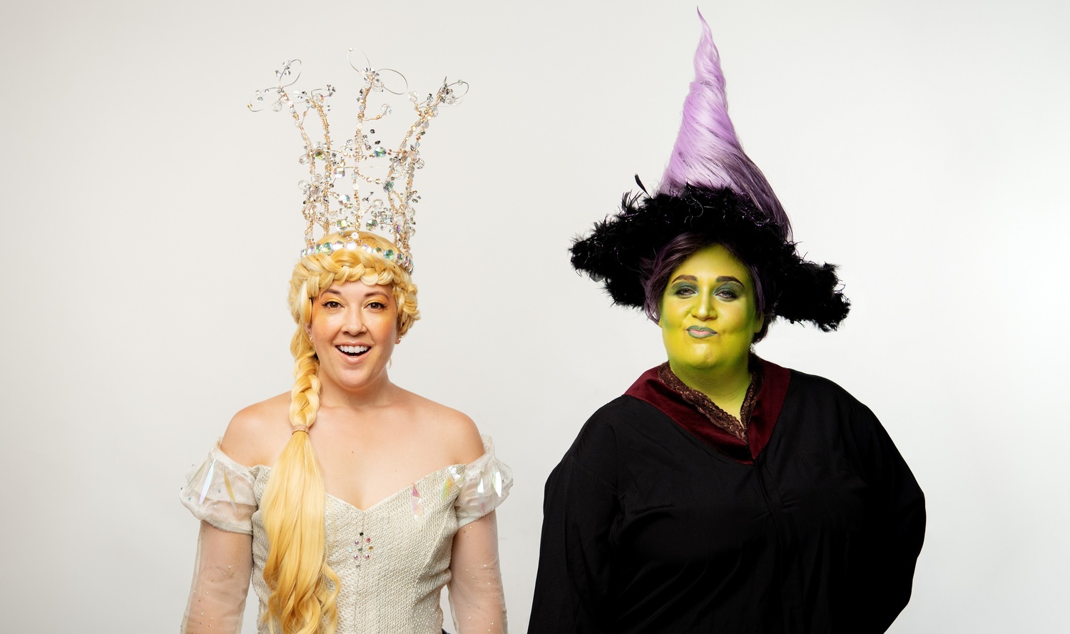 Glinda (MEGAN MCGRATH) and Wicked Witch of the West (BRIEL POMERANTZ) pose together in Berkeley Playhouse's production of The Wizard of Oz, directed by Lexie Lazear. Performing at the Julia Morgan Theater from November 9 to December 23