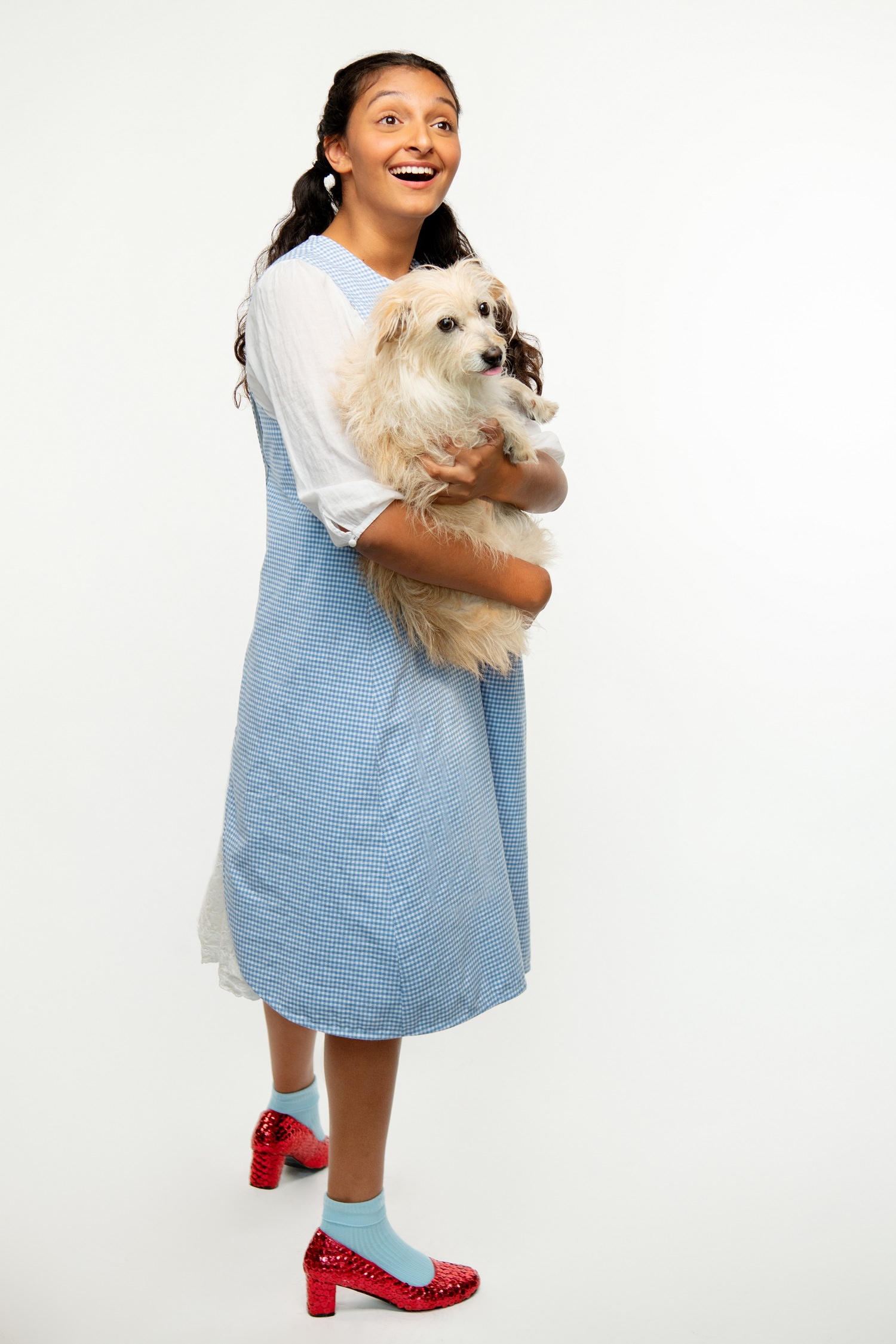 Dorothy (Shayla Lawler) poses in Berkeley Playhouse's production of The Wizard of Oz, directed by Lexie Lazear. Performing at the Julia Morgan Theater from November 9 to December 23.