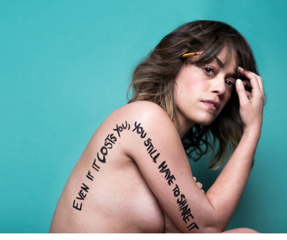 young woman, bare shoulders, with the words 