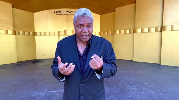 Poe In The Park: Viewable at his YouTube channel, in July of 2022, Darryl Maximilian Robinson onstage at The Levitt Pavilion of MacArthur Park in Los Angeles, recorded The Conqueror Worm by E. A. Poe.