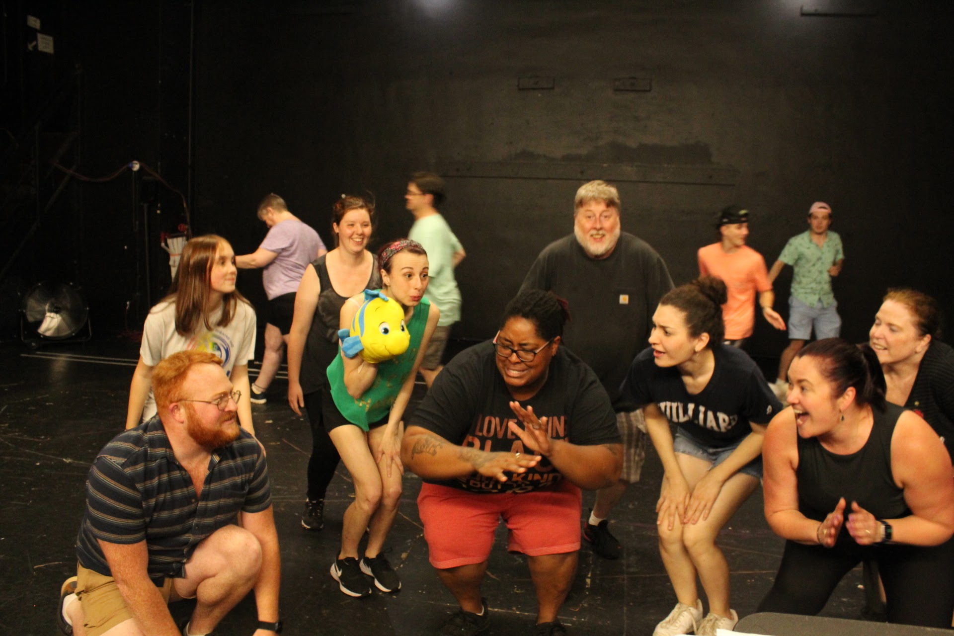 Cast members of Community Little Theatre's production of The Little Mermaid are pictured here rehearsing a scene from the show. From left in front and center are Cody Watson, Ellie Pfohl, Leslie Reed, Germaine Robinson, Mackenzie Richard, Lacey Moyse, and Mary Melquist. In back are Karen McArthur, Birdie Gay, Brian Pfohl, Iver McLeod, Brock Rancourt, and Scotty Venable.