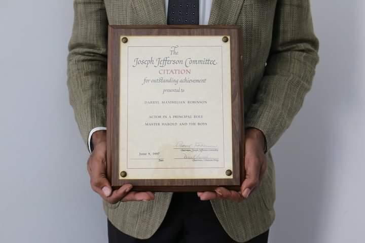 Full Frontal Jeff: ESC Founder Darryl Maximilian Robinson displays his 1997 Chicago Joseph Jefferson Citation Award for Outstanding Actor for Master Harold And The Boys by Athol Fugard.